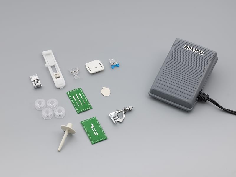 Brother XM3700 included accessories: needles, bobbins, sewing feet, disc screwdriver, darning plate
