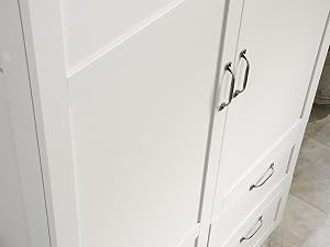 Storage cabinet showing reversible door configuring