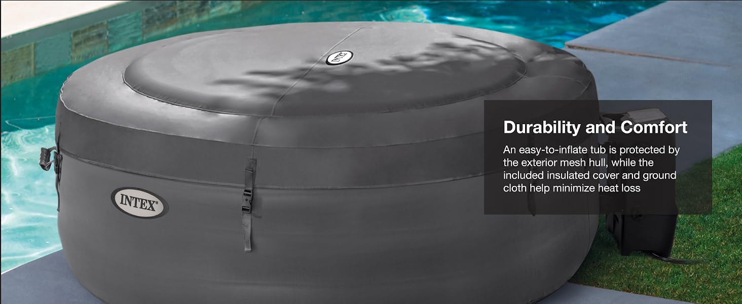 Covered Intex spa beside a pool, designed for insulation and heat retention on grassy patio.