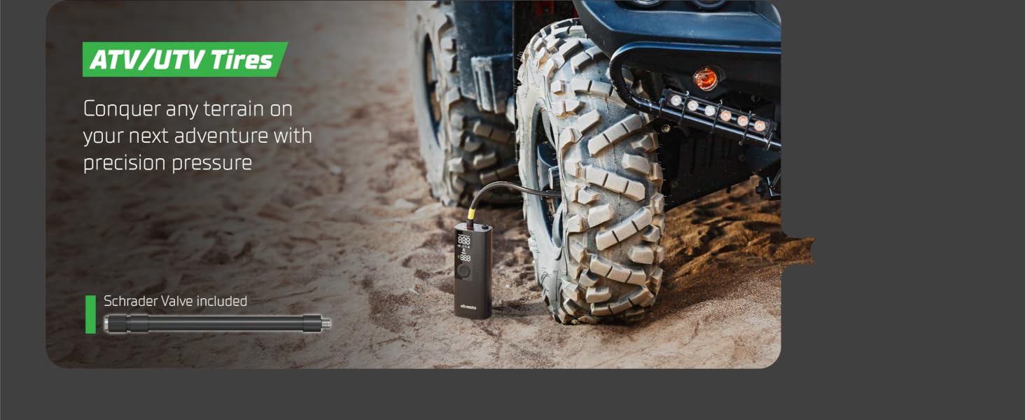 Portable tire pump for car being used roadside with bright LED light feature visible